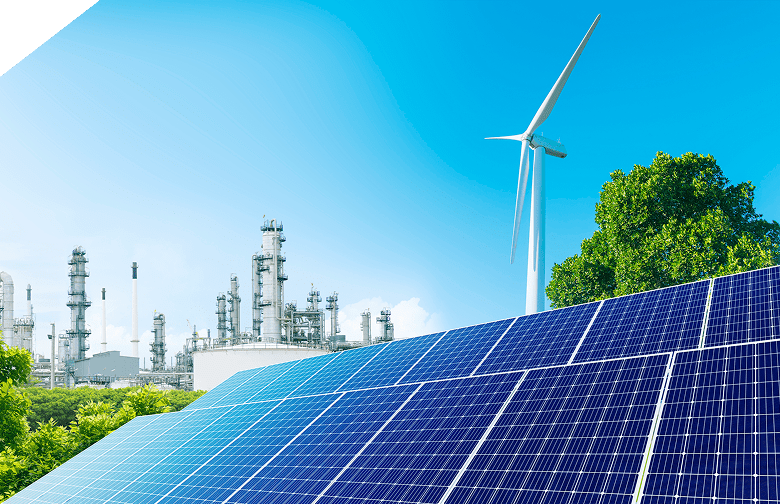 Solar panels, wind turbine, and industrial plant.
